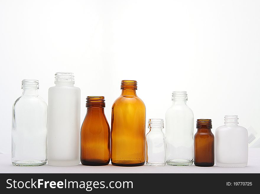 Glass bottle in white background