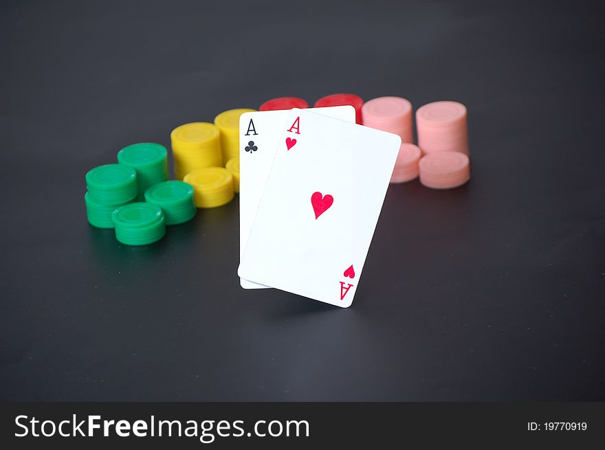 Poker aces and chips