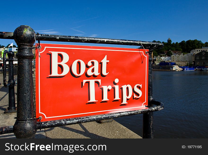 A sign denoting the location of boat trips