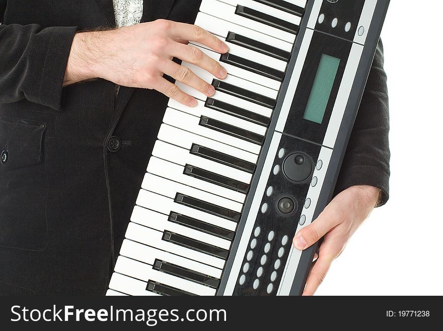 Music synthesizer in male hand. Music synthesizer in male hand