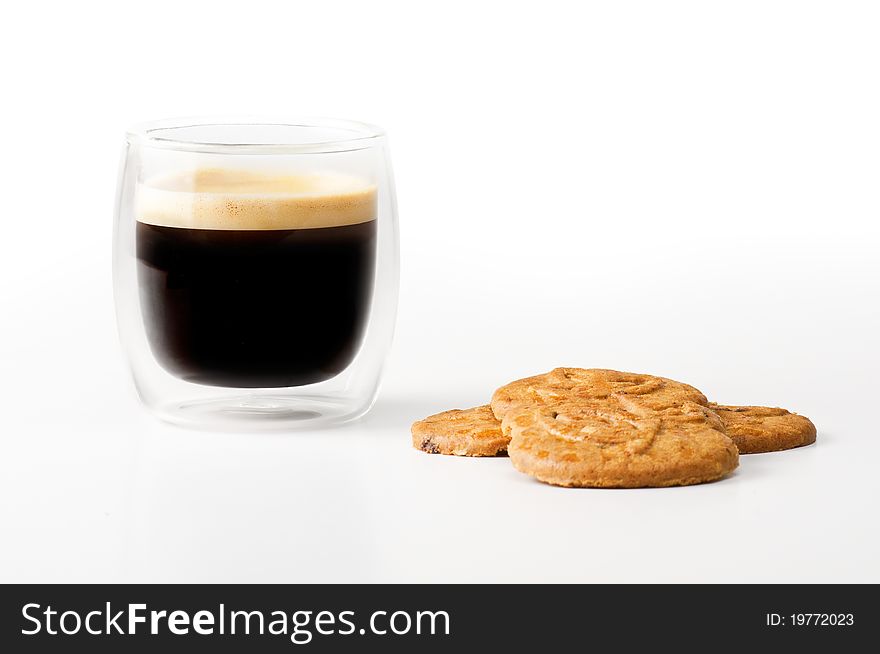 Expresso coffee with some cookies on a white background
