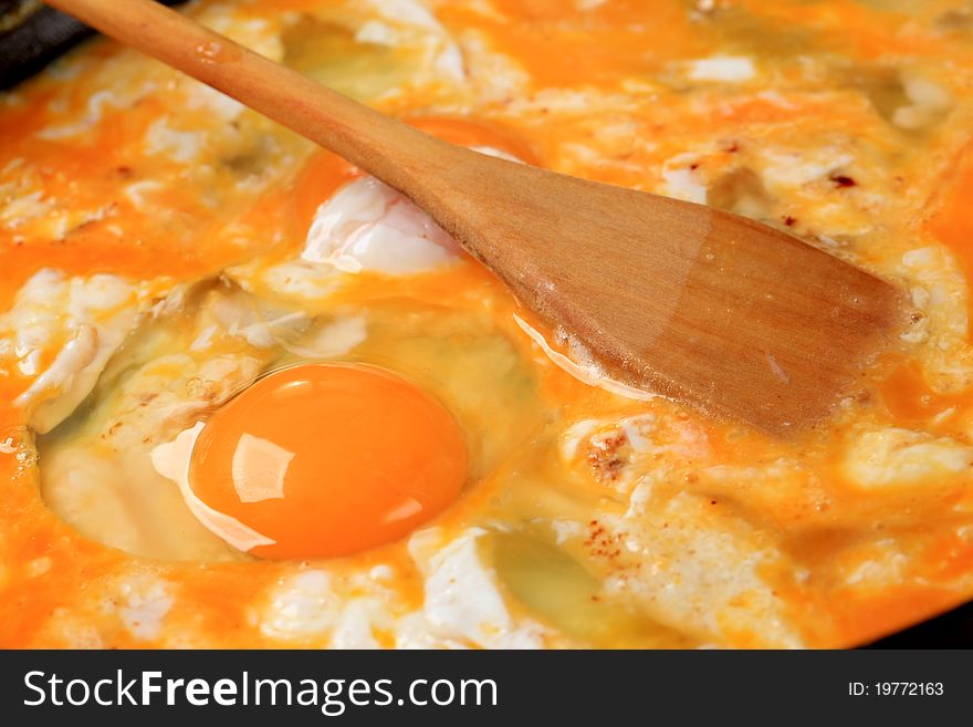Detail of fresh eggs in a frying pan. Detail of fresh eggs in a frying pan