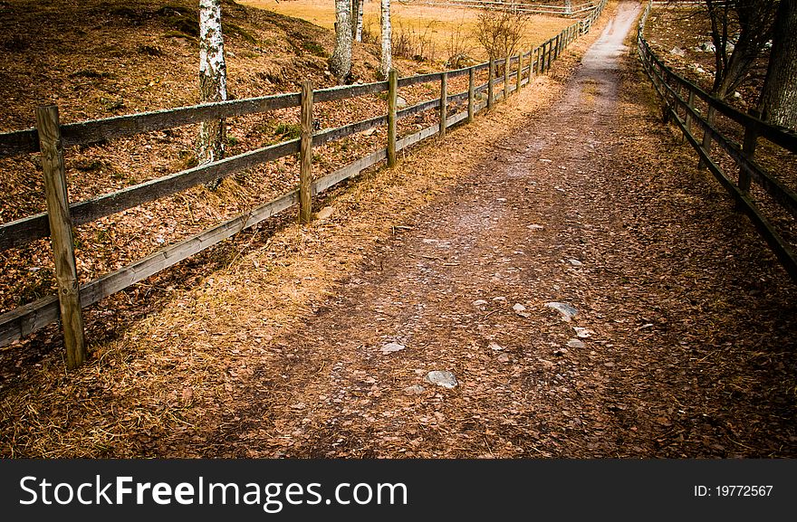 A wooden fence on a farm in Sweden. A wooden fence on a farm in Sweden
