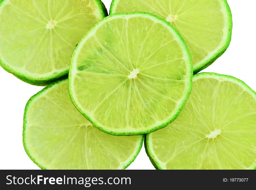 Close up of slice green lemons isolate on white background