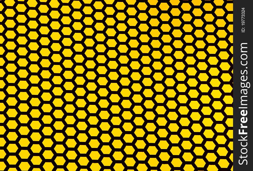 Hexagon design with a bright yellow background