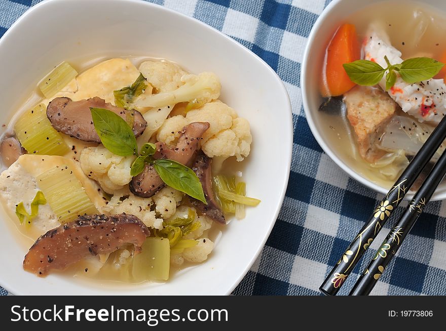 Healthy meal of mixed vegetables main dish and vegetarian seafood soup. Healthy meal of mixed vegetables main dish and vegetarian seafood soup.