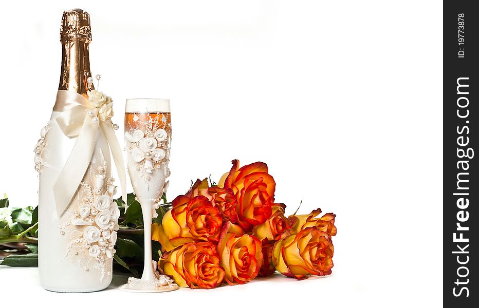 One glass of celebratory champagne with single white rose. One glass of celebratory champagne with single white rose