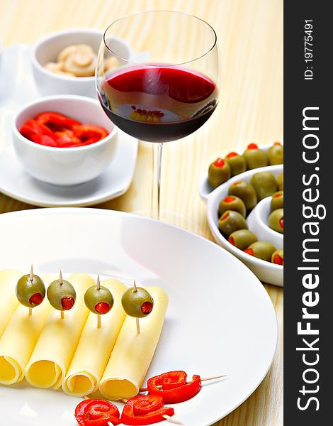 Cheese with stuffed green olives and red pepper. Cheese with stuffed green olives and red pepper