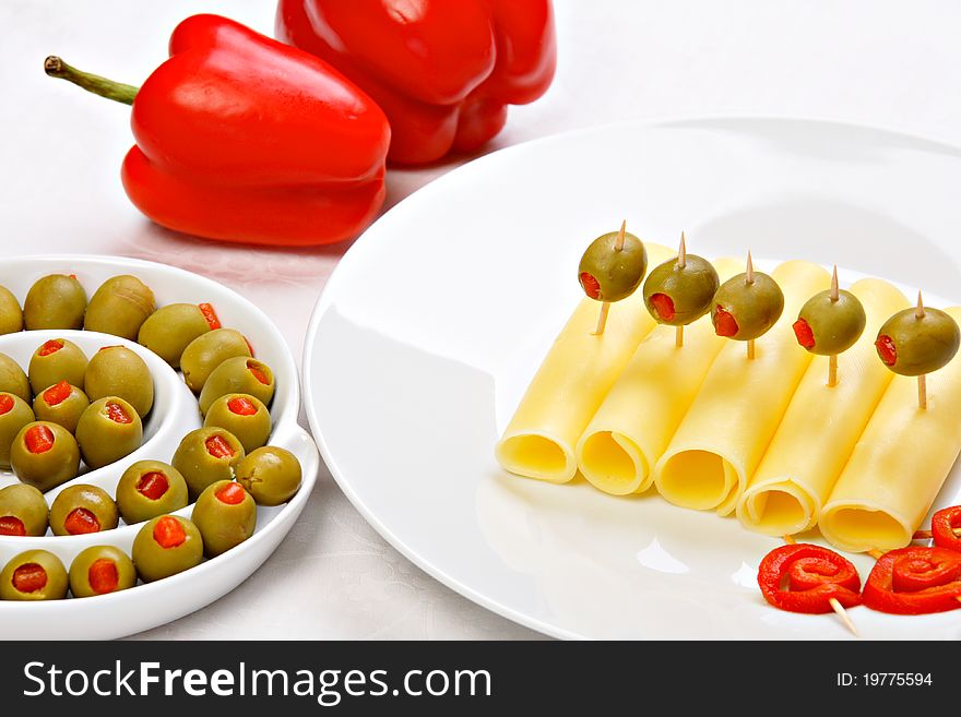 Cheese with stuffed green olives and red pepper. Cheese with stuffed green olives and red pepper