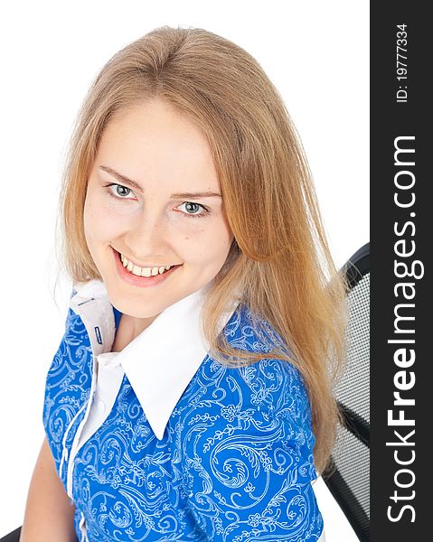 Young beautiful business woman sitting in chair looking up and smiling. Young beautiful business woman sitting in chair looking up and smiling