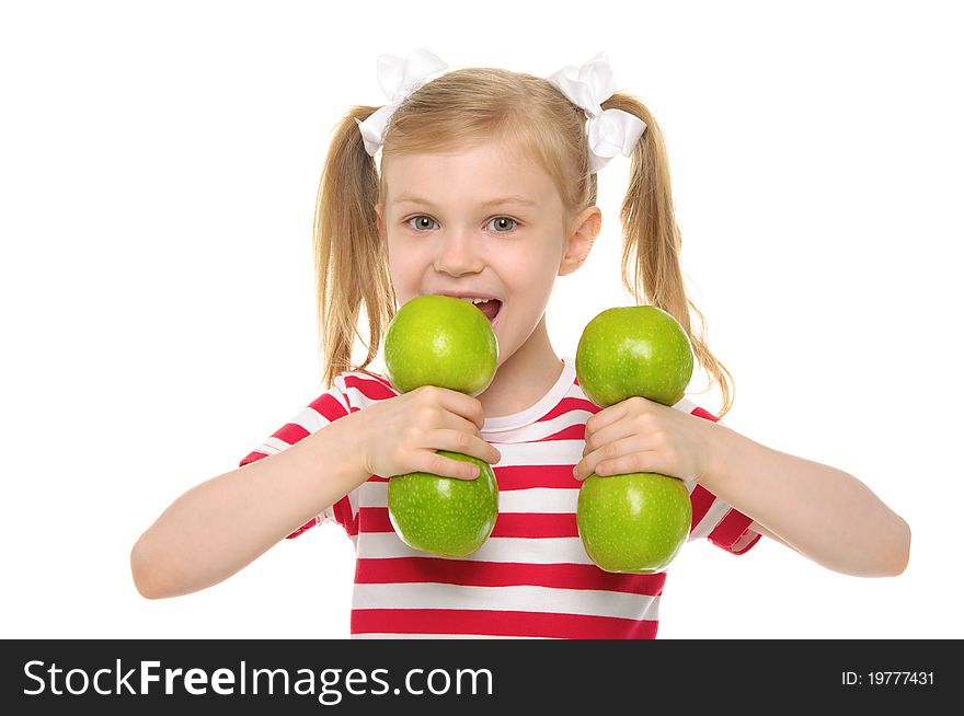 Girl bites dumbbell from apples isolated on white