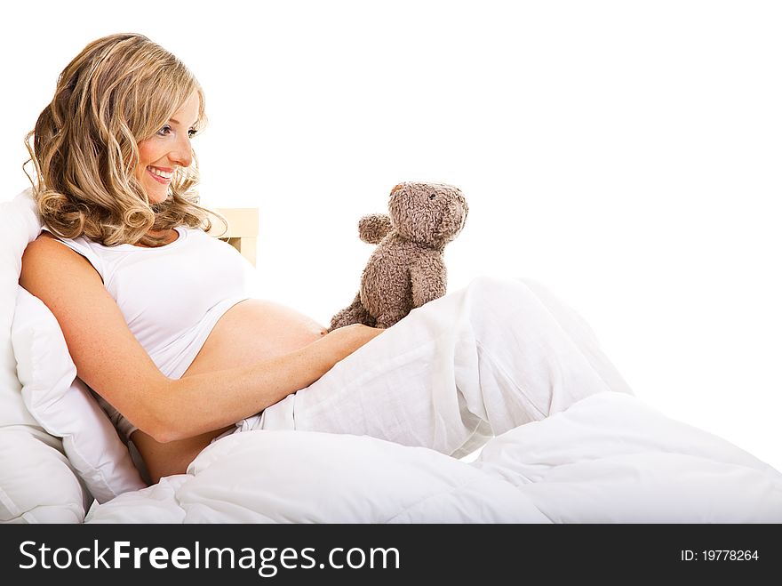 Pregnant Woman In Bed