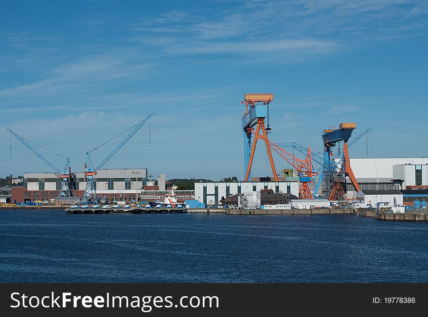 Shipyard of Kiel, Germany, with cranes and submarine. Shipyard of Kiel, Germany, with cranes and submarine