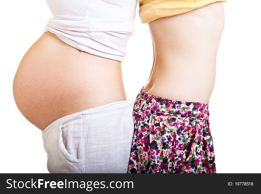 Comparision of pregnant and normal bellies isolated on white