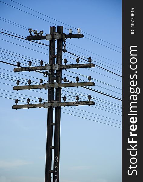 Electricity poles and wires used for transmission of the Sunset train. Electricity poles and wires used for transmission of the Sunset train