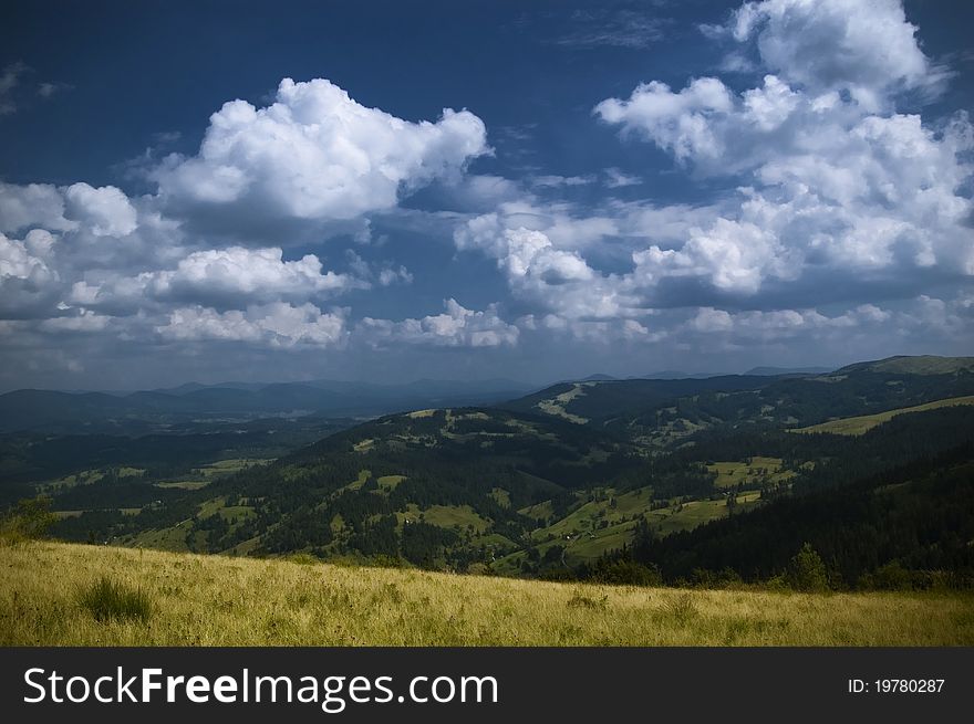 Beautiful clouds over Carpathian mountains