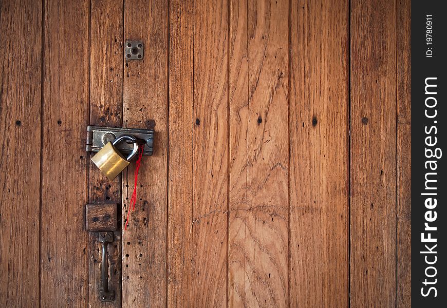 Texture of Old wood door close and lock