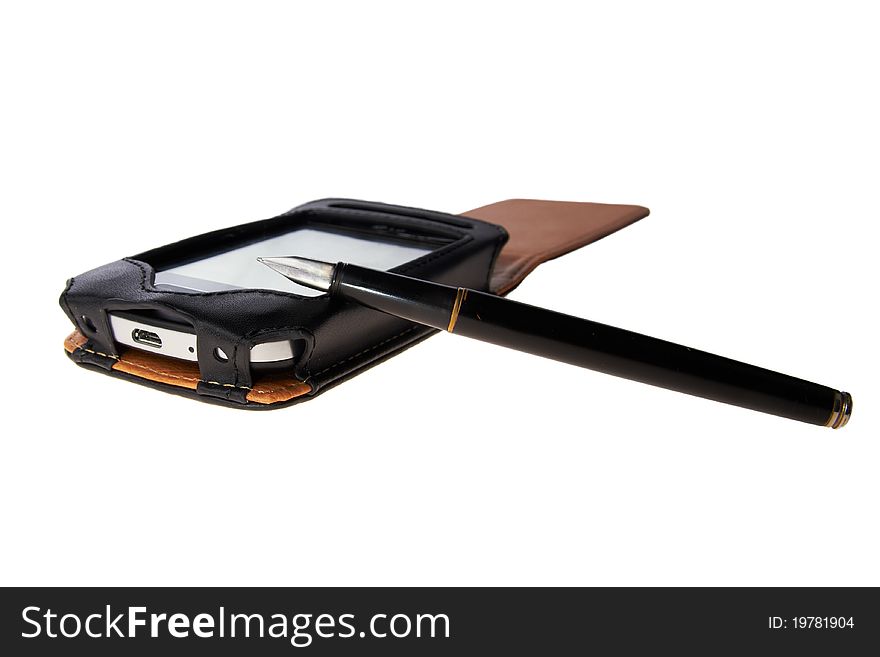 Mobile phone in a leather pouch with the fountain pen lying on a white table. Mobile phone in a leather pouch with the fountain pen lying on a white table.