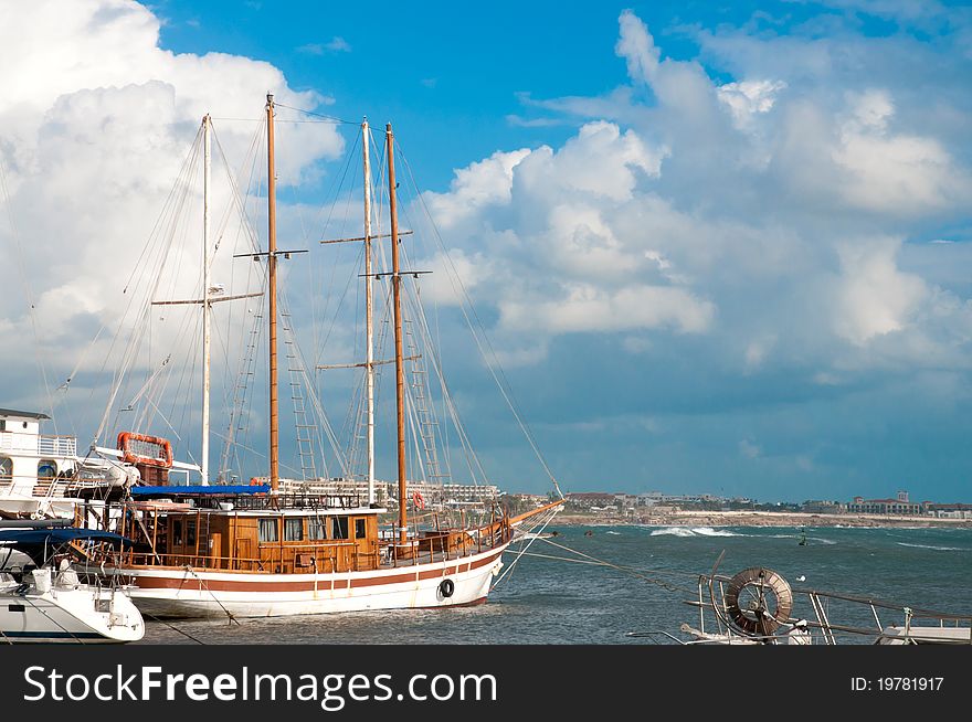 Cruise sailboat anchored in marina