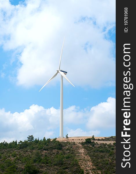 Wind mill power generator. Vertical landscape image