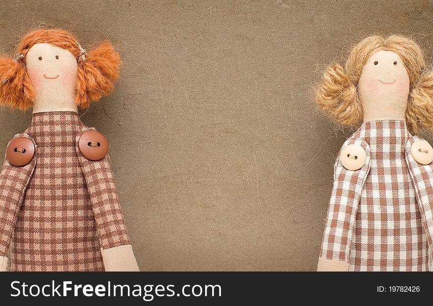 Vintage paper background with handmade toy. Vintage paper background with handmade toy