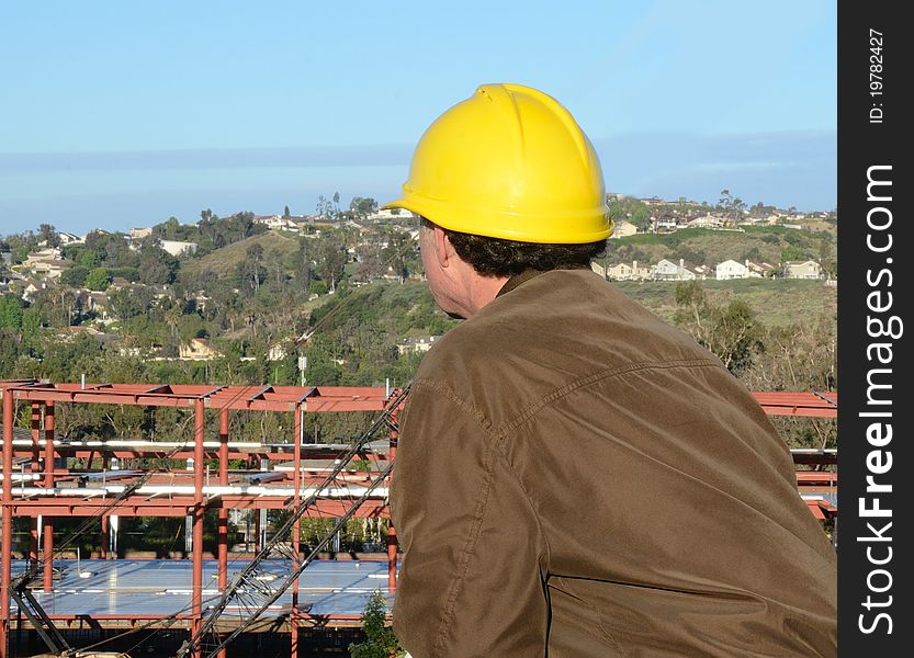Supervisor overlooking and inspecting a construction job. Supervisor overlooking and inspecting a construction job