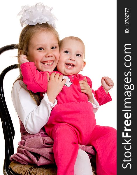 Two sisters on a white background.