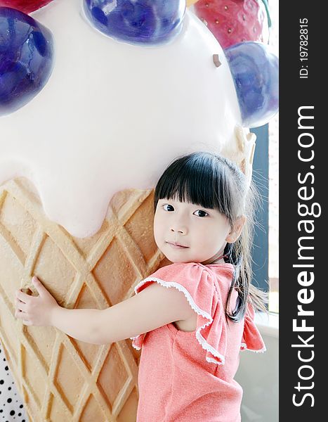 Bright picture of adorable chinese girl and ice cream. Bright picture of adorable chinese girl and ice cream