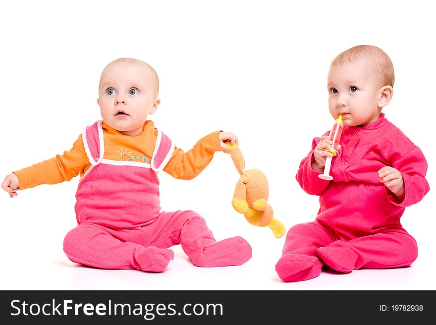 Two baby on a white background.