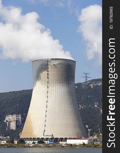 Smokestack of nuclear plant and blue sky. Smokestack of nuclear plant and blue sky