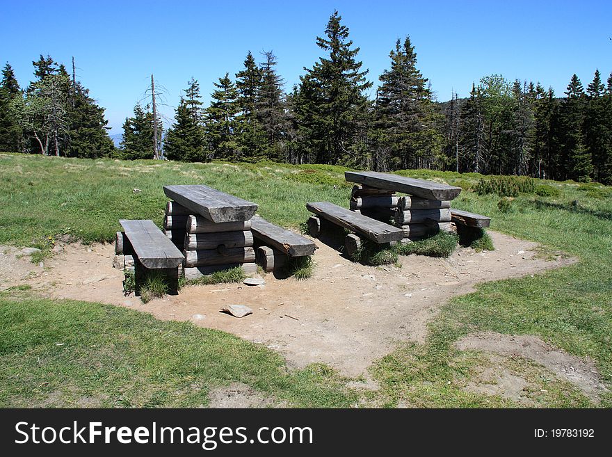 Open air picnic table on the beautiful summer day.