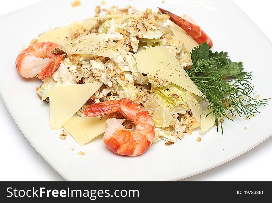 Food - salad with shrimp on white plate