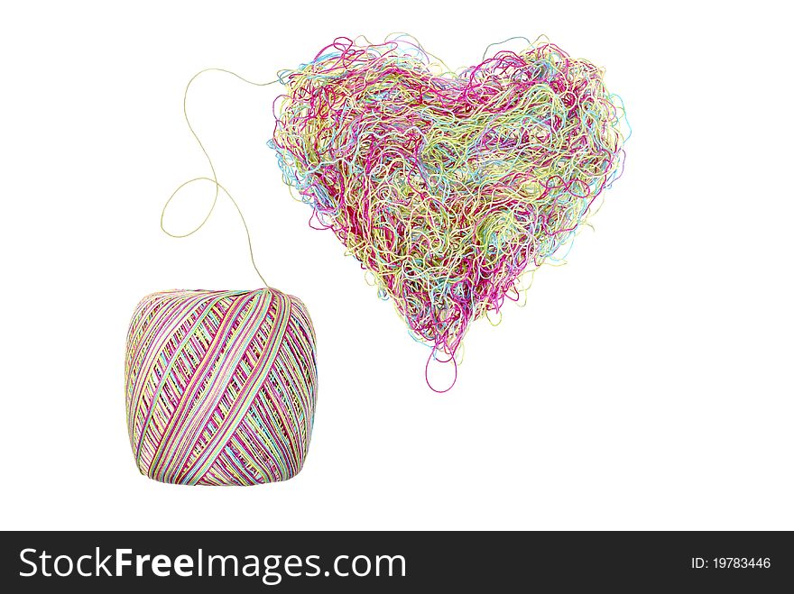 Multicolored heart of yarns isolated on white