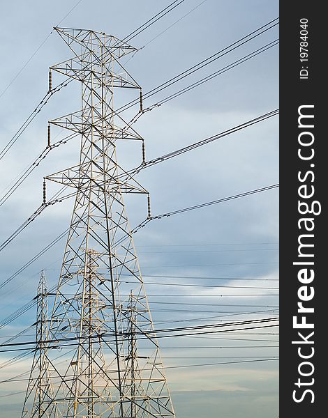 High voltage electricity pillars and blue sky