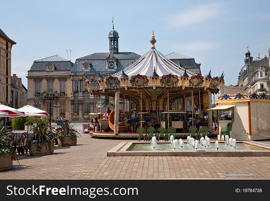 Traditional merry-go-round on town square, France