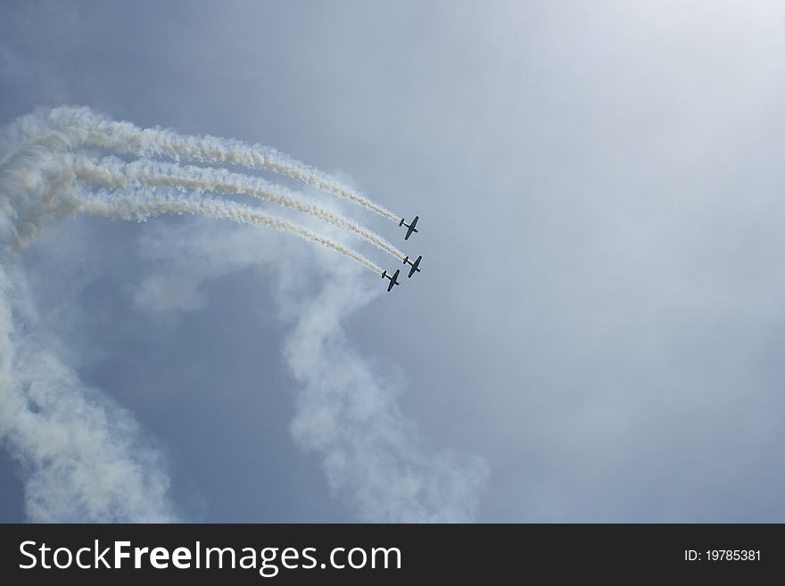 Acrobatic flight at an aviation show, raw. Acrobatic flight at an aviation show, raw