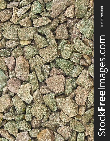 Multicoloured assorted small angular stones. Multicoloured assorted small angular stones
