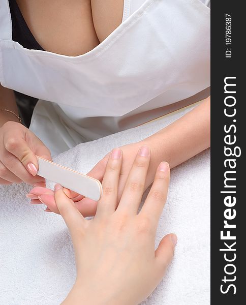 Procedure of making manicure using nailfile. Procedure of making manicure using nailfile