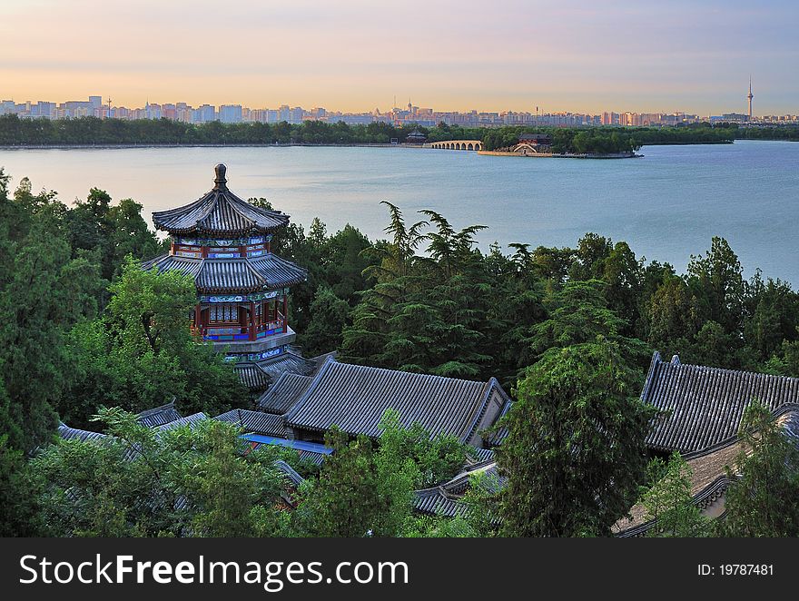 The Summer Palace is the most famous emperor garden in china. Ancient gardens in the modern city is Beijing cityscape. The Summer Palace is the most famous emperor garden in china. Ancient gardens in the modern city is Beijing cityscape.