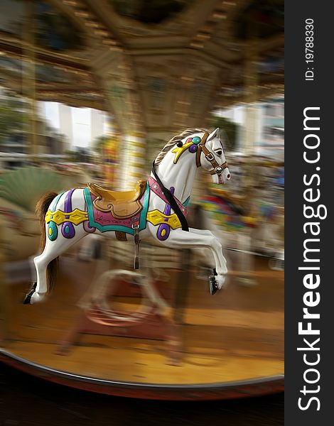 Carousel Horse, fairground and a merry go round rides for children