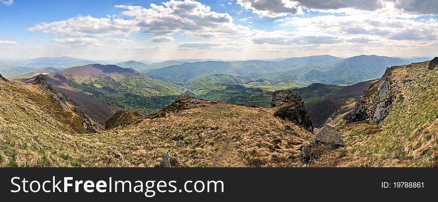 On rocky Carpathian Pikuj (1408 m) peak. Panorama view. On rocky Carpathian Pikuj (1408 m) peak. Panorama view