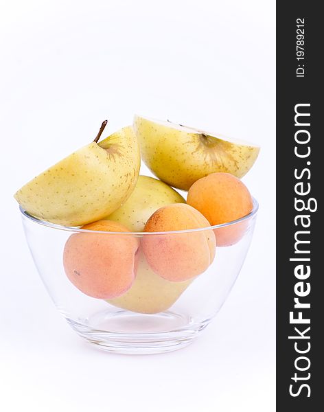 Fresh apricot and apples in dish