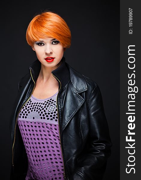 Redhead Woman black leather jacket. Redhead Woman black leather jacket