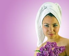 Young Girl With Towel And Lilac Stock Images Young Girl With Towel And Lilac Stock Images