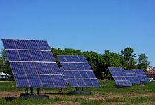 Solar Panels Against Blue Sky Stock Photo
