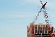 Large Construction Crane And Tall Building Royalty Free Stock Image