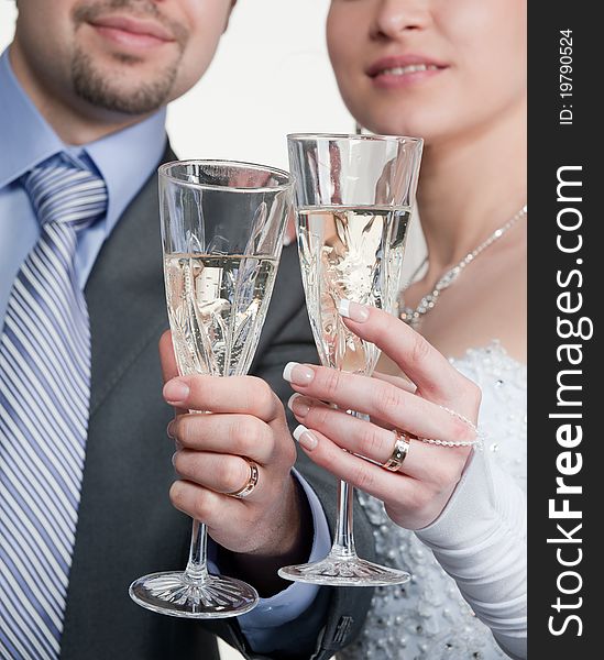 Happy bride and groom toasting with champagne. Happy bride and groom toasting with champagne