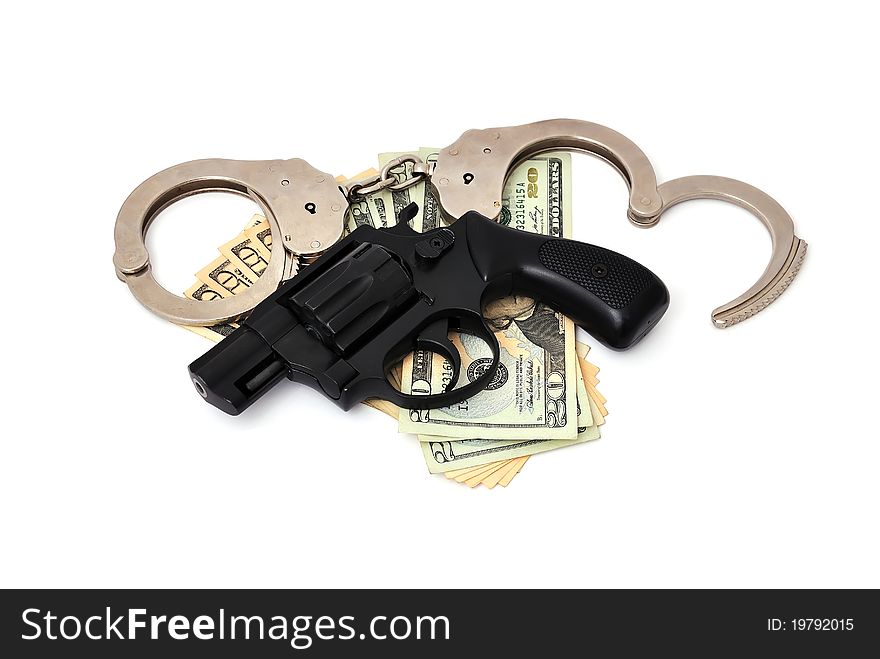 Revolver,  dollars and the handcuffs