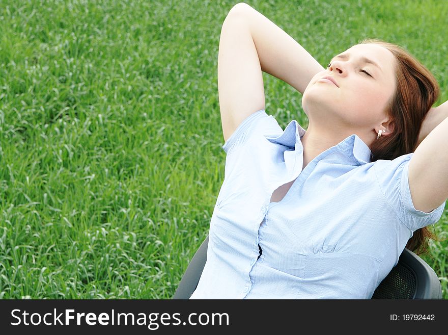 Girl resting in the field