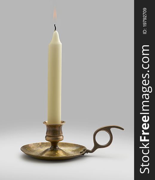 Old Candlestick with flame lights. Old Candlestick with flame lights